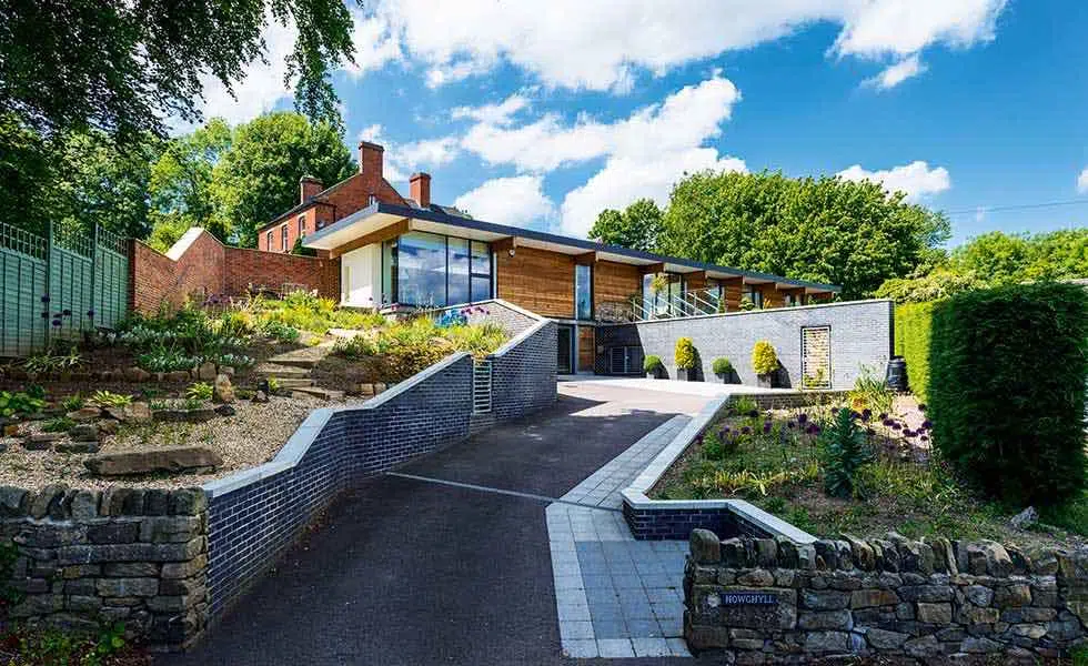 a contemporary self-build built on a sloping garden plot